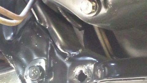 1980 Ford Mustang - Underside view of vehicle frame and suspension components, no specific model year identifiable.