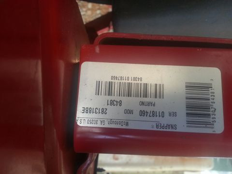 1965 Ford Mustang - A label on a red component shows part and serial numbers for a Snapper product.