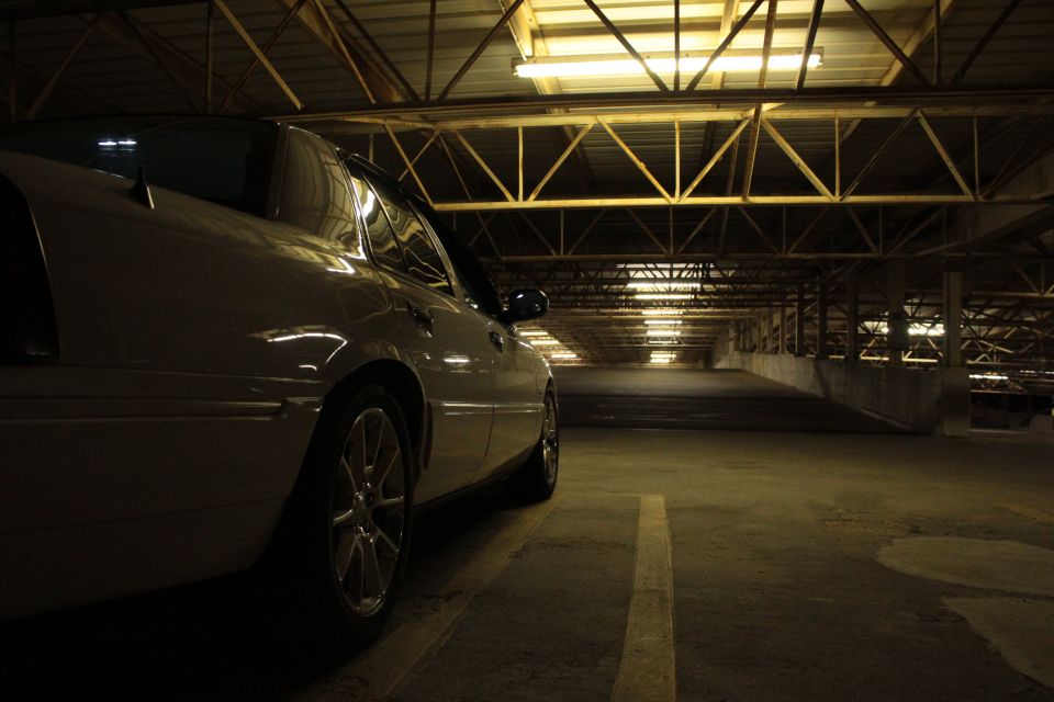 2000 Mercury Grand Marquis parked in a dimly lit parking garage