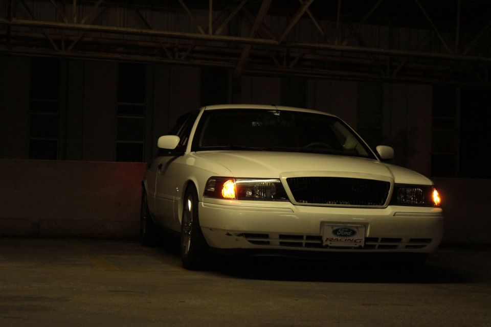 White 2000 Mercury Grand Marquis front view with Ford Racing plate