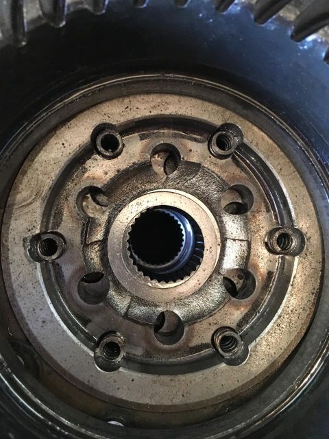 1996 Ford Bronco - This is a close-up view of a differential gear part, showing its internal splines and mounting holes.