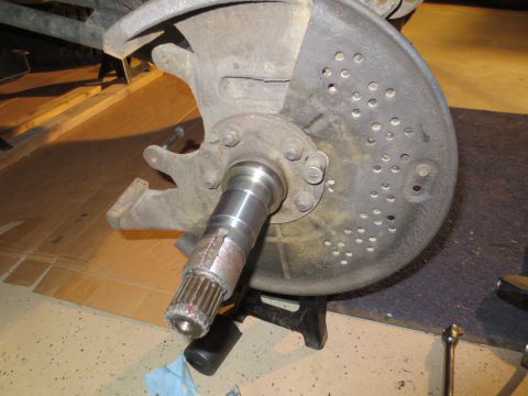 1996 Ford Bronco - This photo shows a vehicle's wheel hub and brake rotor assembly, likely during maintenance or repair.