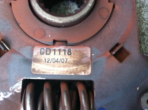 1993 Ford Taurus - Close-up of a clutch pressure plate, showing a label with the part number CD1118 and a date of 12/04/07.
