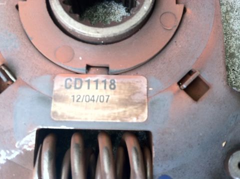 1993 Ford Taurus - Close-up of a clutch pressure plate showing part number CD1118 and manufacturing date 12/04/07.