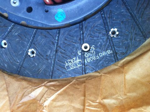 1993 Ford Taurus - Close-up of a clutch disc showing the Valeo F8081 part number and a manufacturing date of March 2010.