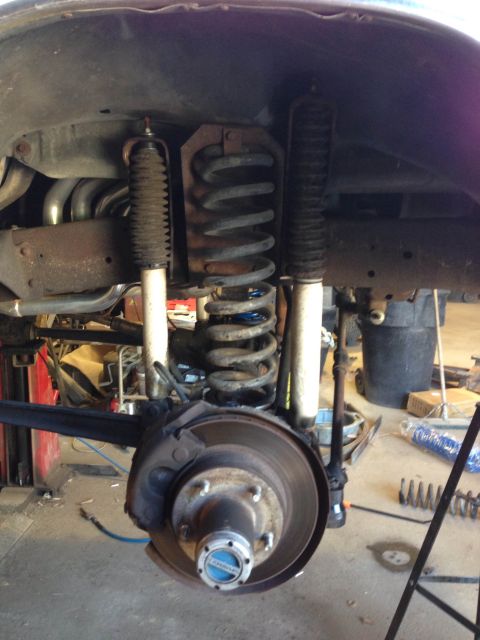 1979 Ford Bronco - Close-up of the front suspension and brake assembly of a 1979 Ford Bronco.
