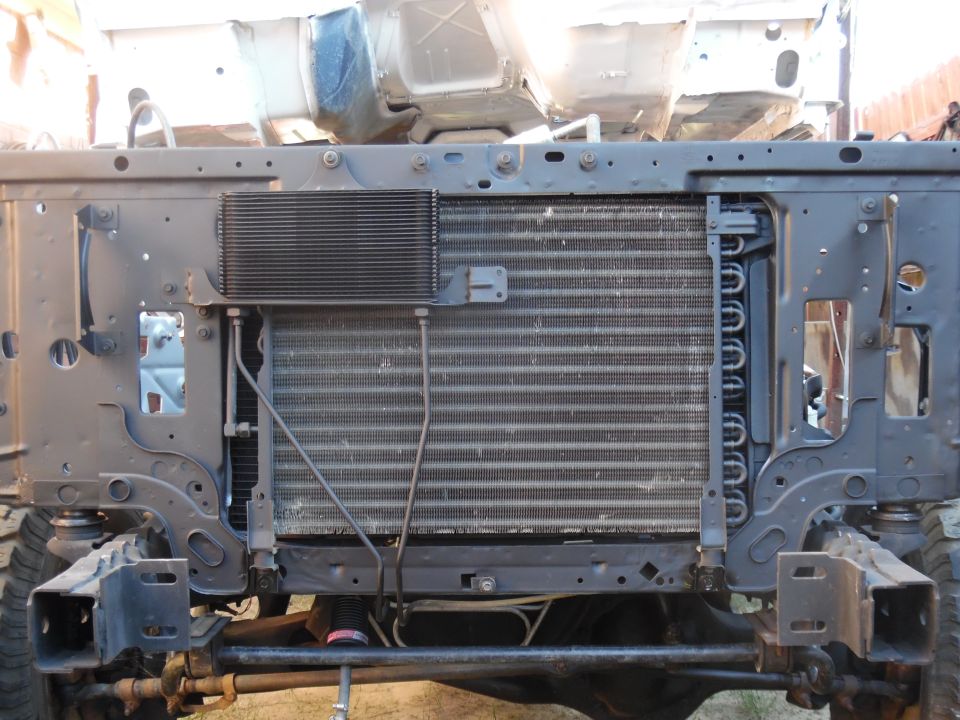 I was hoping to swap in a parallel-flow condenser, but this A/C system is still sealed & working, so I'll keep using it for now.  It's quick & easy to swap the whole mess out later.