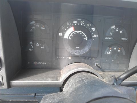 1994 Ford Bronco - The image shows the dashboard of a vehicle, including the speedometer, fuel gauge, temperature gauge, oil pressure gauge, and odometer. The…