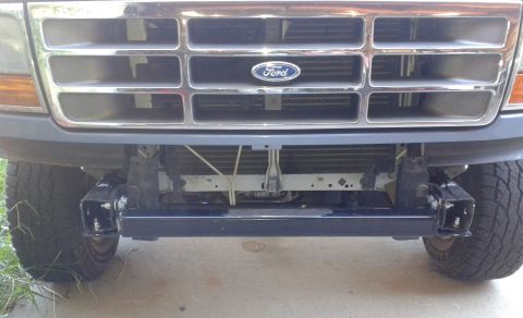 1996 Ford Bronco - Front view of a 1996 Ford Bronco showing the installed front hitch receiver and the distinctive grille.