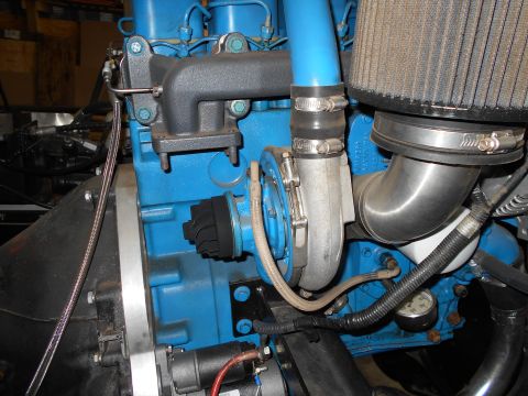 1992 Ford Bronco - Engine components including a turbocharger and exhaust manifold are shown in detail.