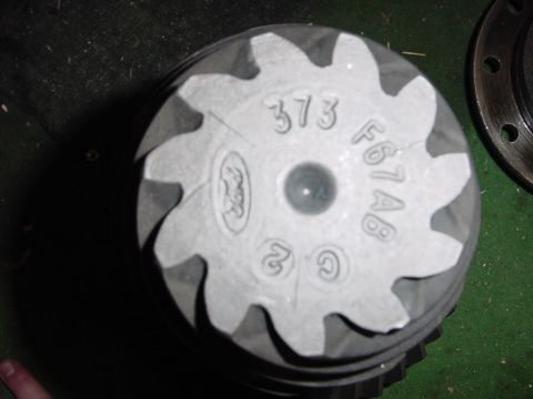 1989 Ford Bronco - Close-up of a Ford differential gear, showing part numbers and the Ford logo.