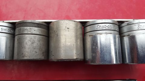 1965 Ford Mustang - Close-up of a Snap-on socket set, showing several individual sockets.