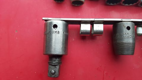 1965 Ford Mustang - A close-up view of a socket set, readable text indicating sizes and manufacturer.