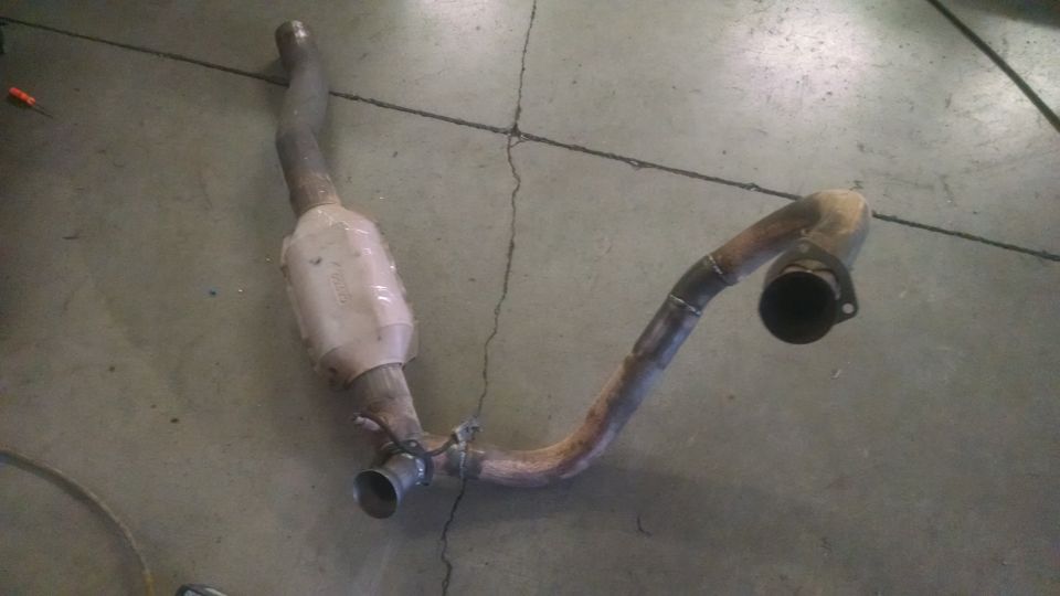 Exhaust pipe with catalytic converter removed from a vehicle