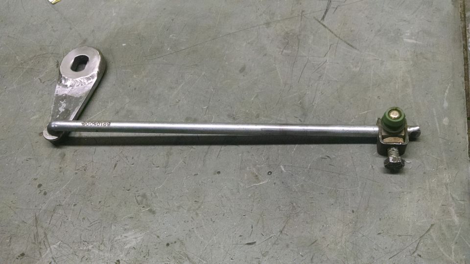 Shift linkage rod with bracket and green cap