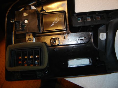 1996 Ford Bronco - This is a close-up view of the interior dashboard components of a vehicle, showing a vent and wiring.