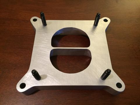 1981 Ford LTD - Studs installed. The upper plenum fits it perfectly. I need to cut a gasket for it because Ford used an o-ring and I changed the port just…