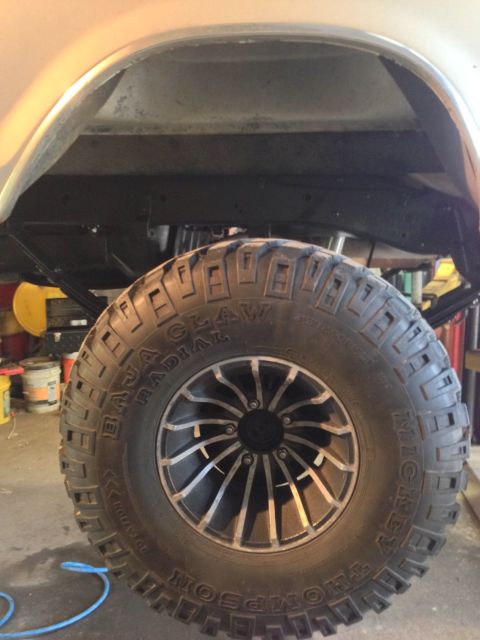1979 Ford Bronco - Off-road tire and suspension components are visible in this close-up shot.