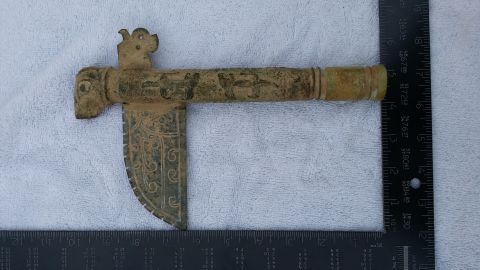 2007 Subaru Impreza - This bronze axe, possibly an artifact, is shown with a ruler for scale, indicating its dimensions.