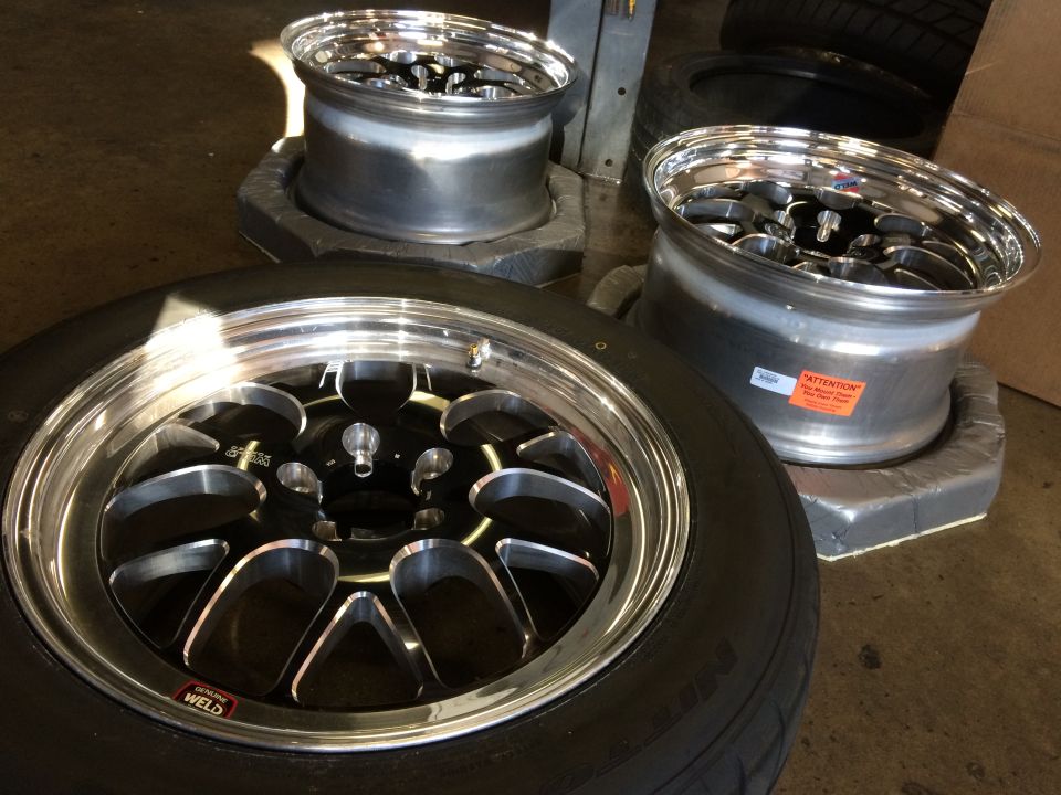 Weld Racing wheels with polished lips and black centers