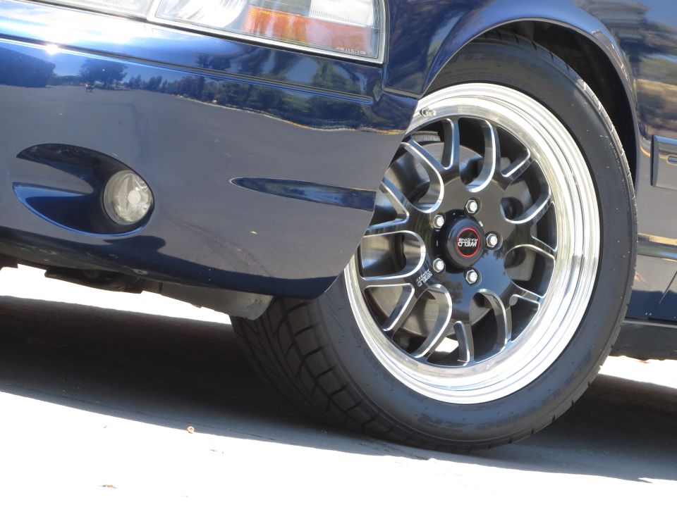 Blue 2003 Mercury Marauder front wheel with Weld wheels
