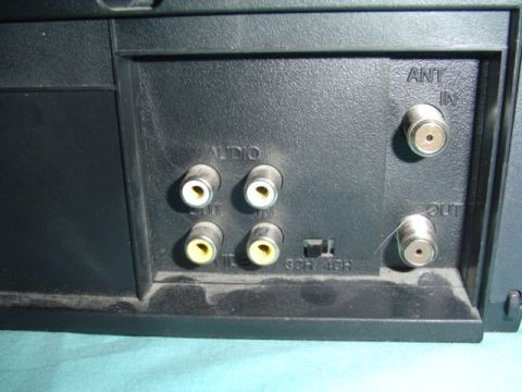 1999 Ford Taurus - Back panel of an electronic device shows audio/video connections and antenna inputs.