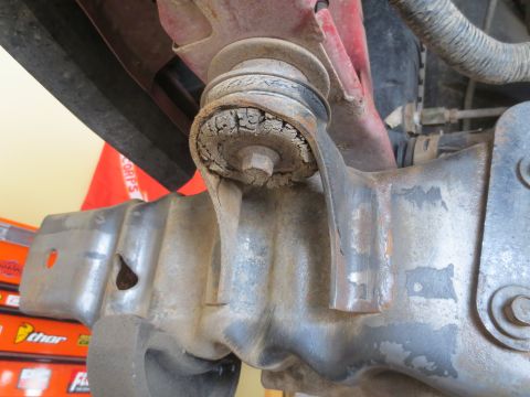 1996 Ford Bronco - This worn suspension bushing needs replacement to ensure proper vehicle handling and safety.