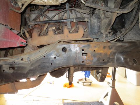 1996 Ford Bronco - Underside view of engine and chassis components, showing rust and wear.