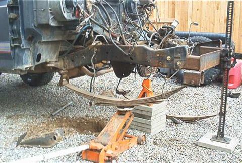 1986 Ford Bronco - I made the hangers out of two pieces of the 3x4. I cut the pieces to 5" with a cutting wheel, drilled it with out to 5/8ths, cut the bottom…