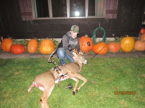 1978 Ford Bronco - Hunter poses with a deer and pumpkins after a successful hunt on October 30, 2015.