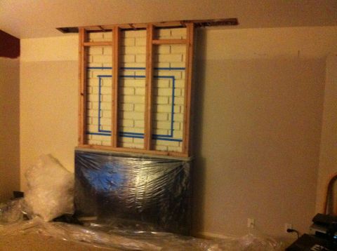 1990 Ford Probe - Construction in progress for a fireplace, showing framing and brickwork.