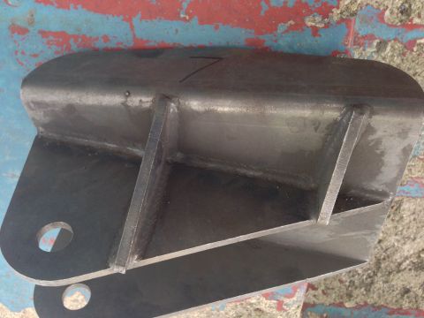 1979 Ford Bronco - A metal bracket, possibly a vehicle part, is shown with a visible number 7 marking.