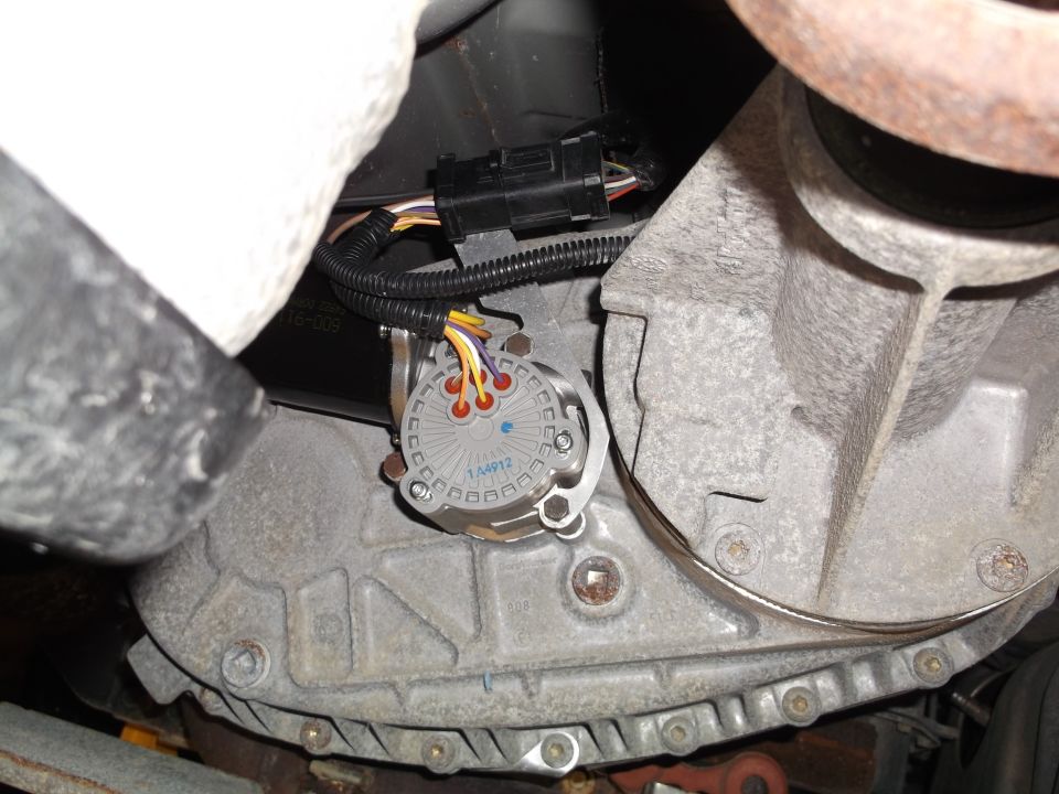 Vehicle transfer case with sensor and wiring harness