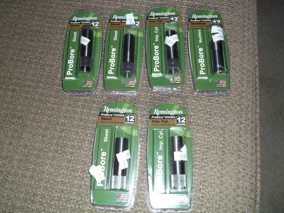 Seven Remington ProBore Choke Tube packages for 12 gauge shotguns.