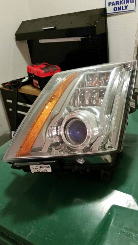 2008 Cadillac CTS - Used driver's side headlamp. Great condition. Amber LED strip does not work. Includes ballast and D1s bulb. All tabs intact. $200