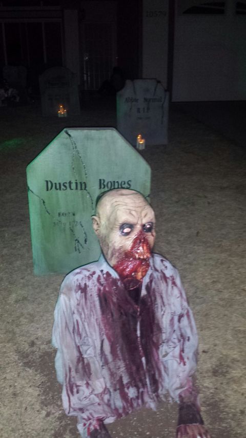 1989 Ford Bronco - A Halloween decoration features a zombie prop in front of a tombstone that reads "Dustin Bones". Another tombstone in the background reads…