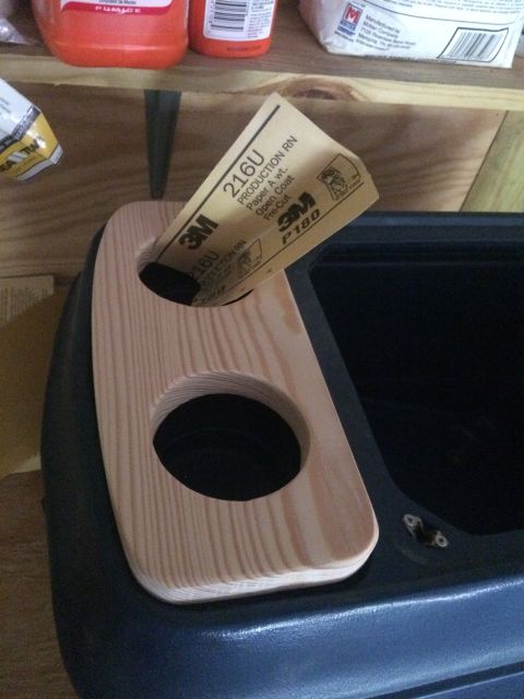 1978 Ford Bronco - I cut this piece by using a paper template to fit in the groove of the cupholders. Cut it a little large. Sand it a lot. Then sand it some…