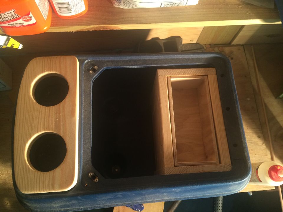 Upper view of the drink holder and the rear interior tray in place.