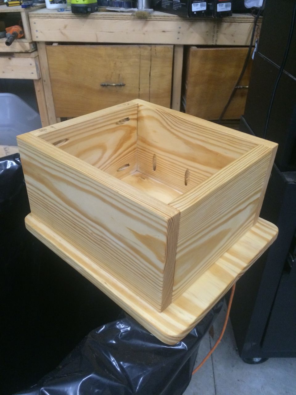 The upper compartment in construction.  A 1x6 box made the lid the perfect height for an arm rest.  I mounted the box to the lid - attached on all corners with Kreg Jig.