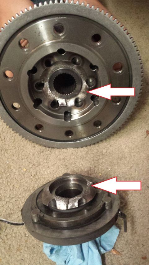 1996 Ford Bronco - Two metal automotive parts are shown. The top part is a large gear with a splined center hub, and the bottom part appears to be a clutch or…