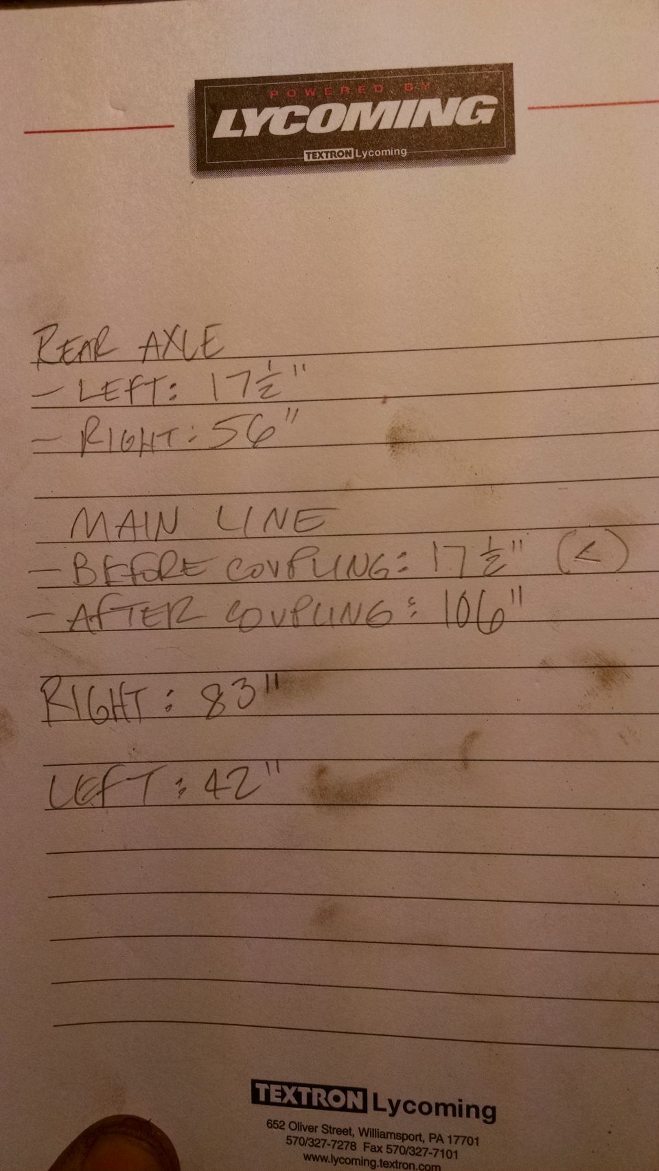 Handwritten document with vehicle measurements for rear axle and main line.