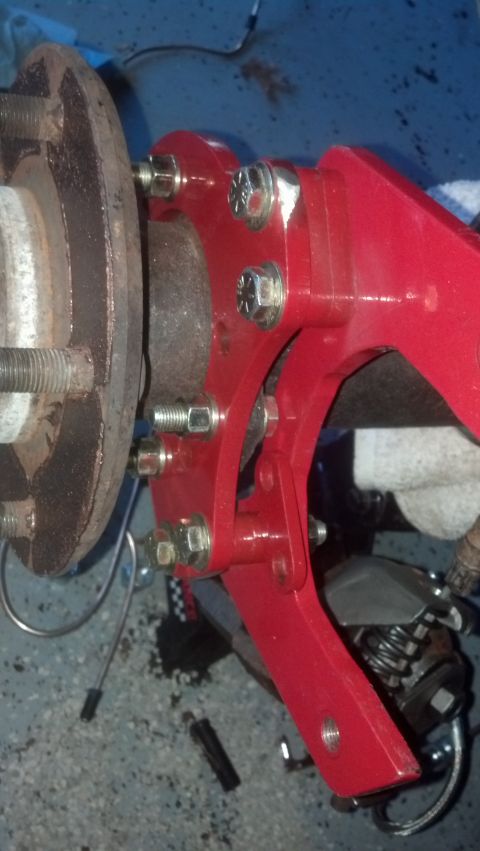 1996 Ford Bronco - OK, the caliper brackets weren't quite right. Here I have flipped the big U-shaped bracket around so the thread bosses (not visible) are to…