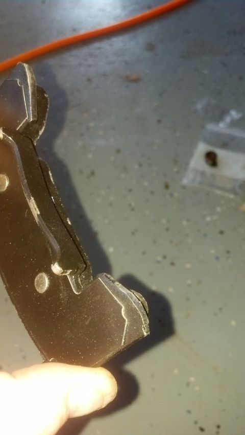 1996 Ford Bronco - Bottom edge of the outboard pad was rubbing the rotor. Removed some of the brake baking plate and bent the top tangs over a little more to…