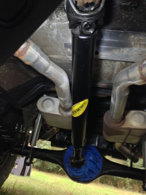 1979 Ford Bronco - Underside view shows driveshaft and exhaust system components.
