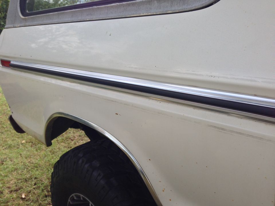 White Ford Bronco side view showing rear quarter panel and fender flare