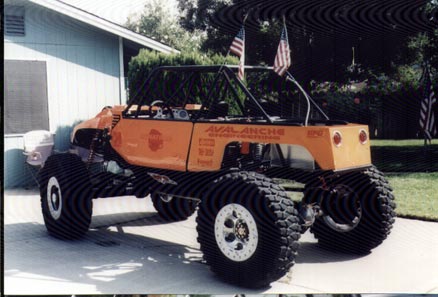 1990 Ford Bronco - Custom buggy with "AVALANCHE" text on the side sits in a driveway.