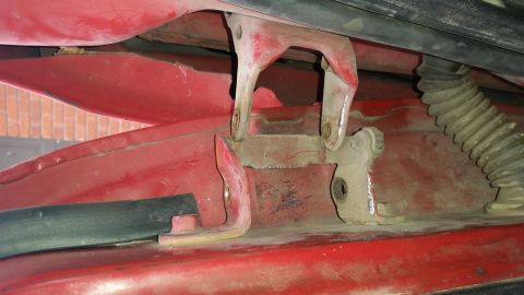 1981 Ford Bronco - Once both pins were out, the door could move. However, both pins needed to be removed for the bushings to be accessible. If one pin was sti…