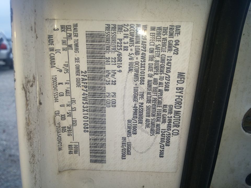 Ford door data plate with VIN, GVWR, tire and paint codes
