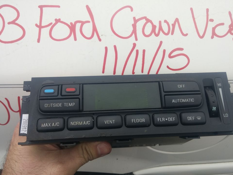 Front face of a Ford EATC climate control panel with buttons