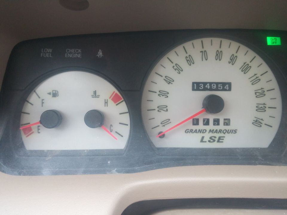 Grand Marquis LSE instrument cluster reading 134954 miles